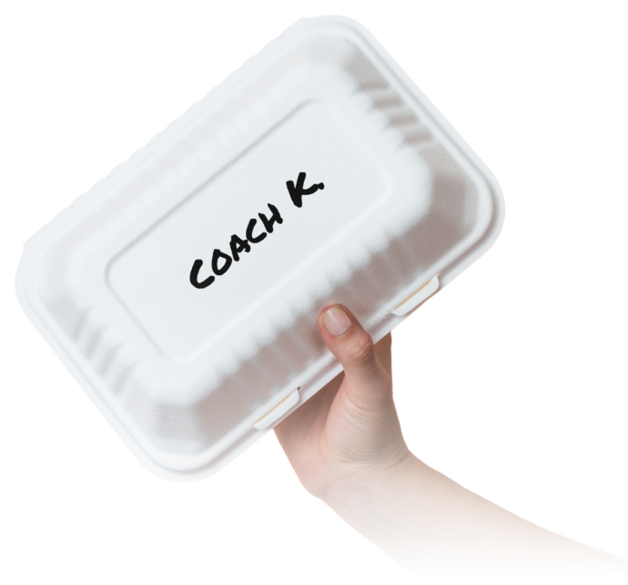 Takeout box with "Coach K" written on it