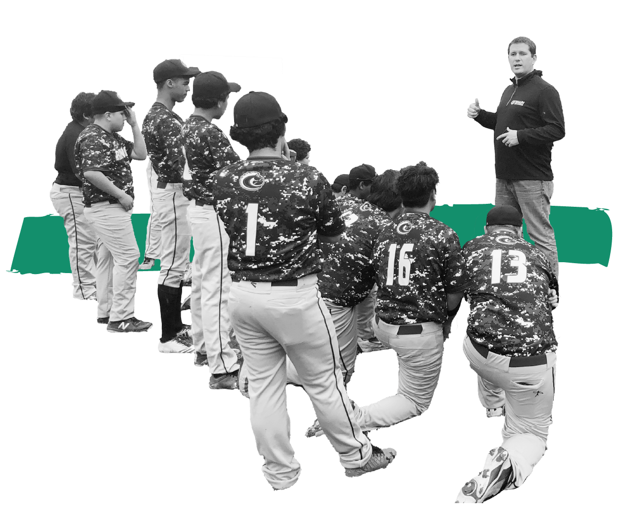 Boys Baseball team kneeling and listening to coach